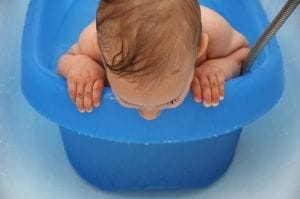 Baby in Blue Bath Seat – Recall Due to Drowning Hazard - Ferraro Law Firm baby in blue bath tub