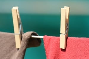 Clothes on Line with Clothespins – Take-Home Asbestos Exposure Case - Ferraro Law Firm clothes drying outdoors on clothing line