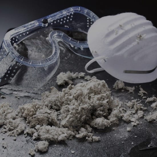 asbestos dust with safety goggles and mask